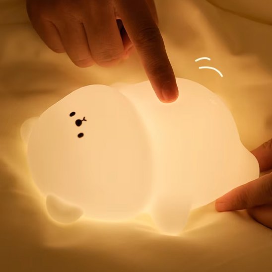 Bebe veilleuse lumière douce doigt
