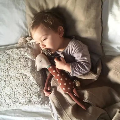 Doudou ultra doux couché